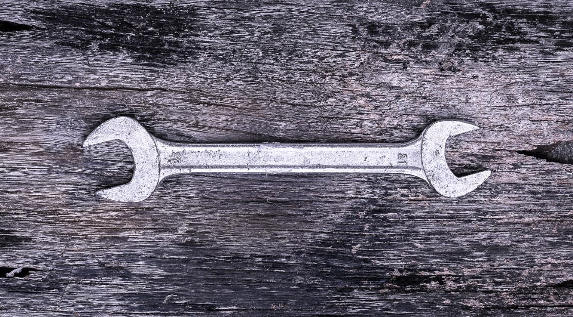 wrench-on-wood-surface