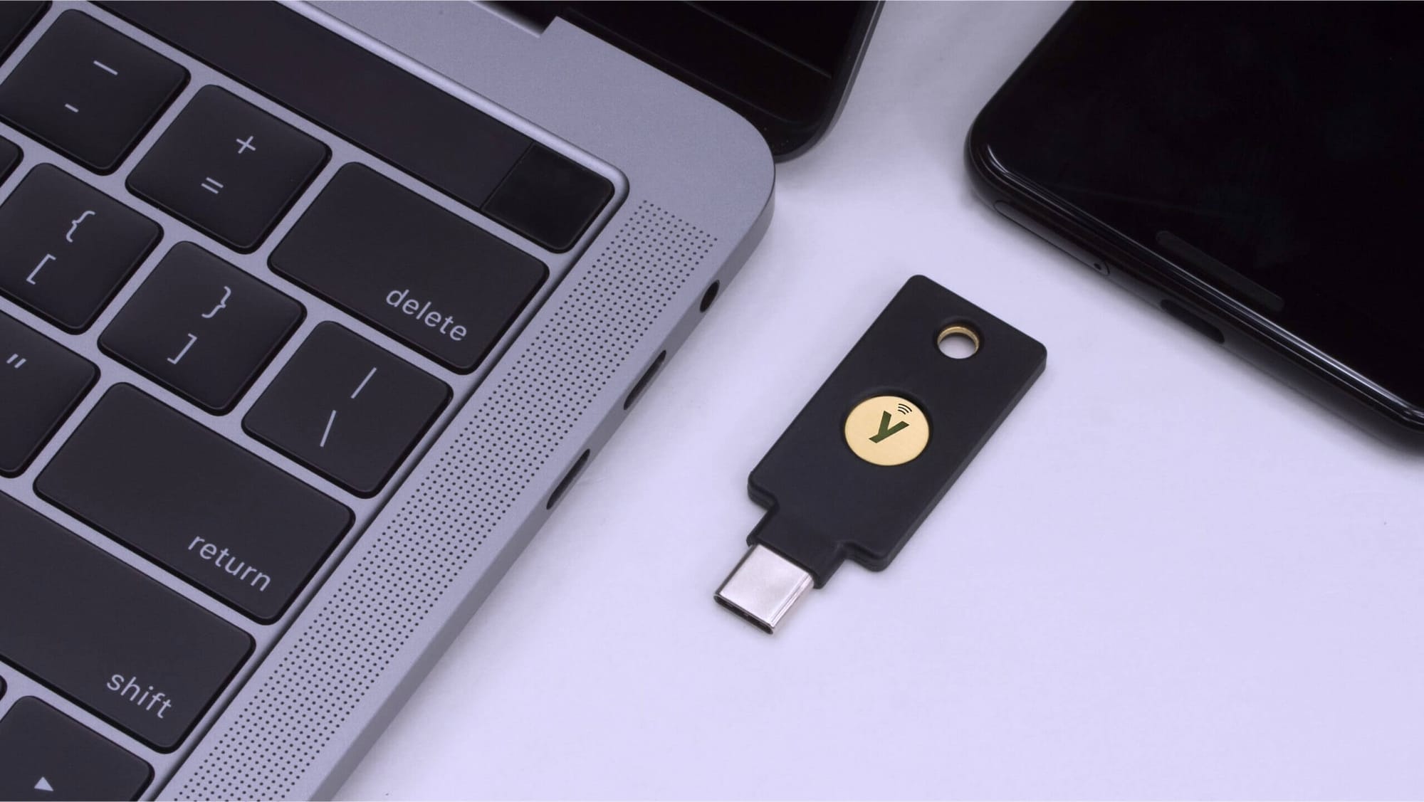 yubikey-next-to-laptop-and-phone